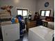 Functional laundry room with washer, dryer, and storage, offering convenience and organization for household chores at 29 Home Ave, Markleville, IN 46056
