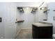 Bathroom featuring a dark vanity with a granite countertop and a door to the bedroom at 2905 Inverrary Ct, Indianapolis, IN 46234
