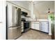 Eat in kitchen features stainless steel appliances and an open concept floor plan at 2905 Inverrary Ct, Indianapolis, IN 46234