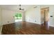 Spacious living room with wood floors and sliding glass doors to the backyard at 2905 Inverrary Ct, Indianapolis, IN 46234