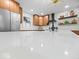 Modern kitchen with stainless steel appliances, white countertops, and wood cabinets at 31 Mckenzie St, Shelbyville, IN 46176