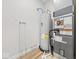 Bright utility room featuring modern water heater and HVAC system on clean floors at 31 Mckenzie St, Shelbyville, IN 46176