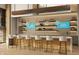 Charming kitchen area featuring a long bar with barstool seating and pendant lighting at 3142 Balsamroot Rd, Greenwood, IN 46143
