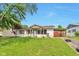 Charming single story home with covered porch and a well-maintained lawn at 3242 Welch Dr, Indianapolis, IN 46224