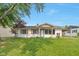 Charming single-story home featuring a well-manicured lawn and inviting covered entry at 3242 Welch Dr, Indianapolis, IN 46224