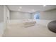 Basement bedroom with a comfortable bed and ample natural light at 3876 Kegler Way, Carmel, IN 46074