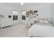Cozy bedroom with natural light, a desk, and a comfortable bed at 3876 Kegler Way, Carmel, IN 46074