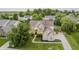 Beautiful brick home with lush green lawn and mature landscaping at 3876 Kegler Way, Carmel, IN 46074
