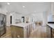 Eat-in kitchen with island and breakfast bar and stainless appliances at 3876 Kegler Way, Carmel, IN 46074