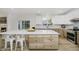 Bright eat-in kitchen with stainless appliances and island with breakfast bar at 3876 Kegler Way, Carmel, IN 46074