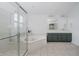 Bathroom featuring glass shower enclosure, soaking tub and double vanity at 3876 Kegler Way, Carmel, IN 46074