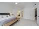 Main bedroom with high ceilings, carpet and ensuite bath at 3876 Kegler Way, Carmel, IN 46074