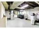 Spacious unfinished basement with a washer, dryer, furnace and water heater at 3940 E 57Th St, Indianapolis, IN 46220