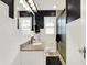 Elegant bathroom featuring granite vanity, and stylish lighting at 3940 E 57Th St, Indianapolis, IN 46220
