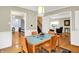 Bright dining room featuring modern table with seating for four at 3940 E 57Th St, Indianapolis, IN 46220