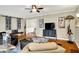 Cozy living space with stylish furnishings and views into the adjacent dining area at 3940 E 57Th St, Indianapolis, IN 46220