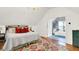 Bright main bedroom with en-suite bathroom featuring a soaking tub at 3940 E 57Th St, Indianapolis, IN 46220