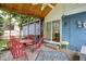 Cozy screened porch with outdoor seating, perfect for relaxing and entertaining at 3940 E 57Th St, Indianapolis, IN 46220