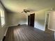 Bedroom with vinyl floors, a closet, and a window at 4343 W Fairview Rd, Greenwood, IN 46142