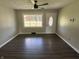 Inviting living room with a large window and a neutral color palette at 4343 W Fairview Rd, Greenwood, IN 46142