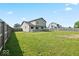 Large, fenced backyard offering ample space for outdoor activities and gatherings at 4605 Clairmont Dr, Columbus, IN 47203