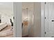 View from hallway, showing a bedroom, stairs, and doorways to other rooms at 4605 Clairmont Dr, Columbus, IN 47203