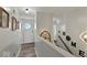Bright hallway with decorative elements, offering a glimpse into the home's stylish interior design at 4605 Clairmont Dr, Columbus, IN 47203