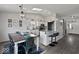 Open-concept kitchen and dining area, featuring modern appliances, stylish decor, and bright, airy ambiance at 4605 Clairmont Dr, Columbus, IN 47203