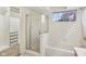 Bright bathroom featuring tub with shower and a closet offering convenience and style at 4933 Common Vista Way, Indianapolis, IN 46220