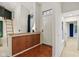 Bright foyer with wood floors, white walls, and natural light creates a welcoming entryway at 4933 Common Vista Way, Indianapolis, IN 46220