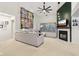 Bright living room featuring a fireplace, large windows, and vaulted ceilings for a modern and airy feel at 4933 Common Vista Way, Indianapolis, IN 46220
