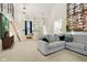 Bright and airy living room with comfortable sofa and unique decor accents at 4933 Common Vista Way, Indianapolis, IN 46220