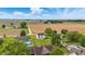 Aerial view of white home with a pool and large backyard at 5030 E 800 N, Columbus, IN 47203