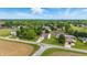 Beautiful aerial view of the home with a well-manicured lawn in a lush, green neighborhood at 5030 E 800 N, Columbus, IN 47203