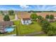 Aerial view of white home with a pool, fenced backyard and rural landscape at 5030 E 800 N, Columbus, IN 47203