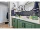 Stylish bathroom with double sinks, modern fixtures, and decorative mirrors at 5030 E 800 N, Columbus, IN 47203