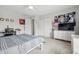 Bright bedroom featuring a bed, closet, and desk area, offering a comfortable and organized space at 5030 E 800 N, Columbus, IN 47203