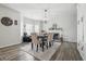 Elegant dining room with a fireplace and a stylish chandelier at 5030 E 800 N, Columbus, IN 47203
