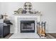 A fireplace features wood mantle, decorative tile, decor, and wood at 5030 E 800 N, Columbus, IN 47203