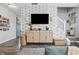 Bright living room with stylish cabinets, decorative accents, and wood flooring at 5030 E 800 N, Columbus, IN 47203