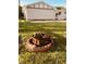 Enjoy outdoor gatherings with this fire pit in the backyard of this property at 514 W 6Th St, Sheridan, IN 46069