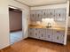 An open view of kitchen cabinets and countertops at 514 W 6Th St, Sheridan, IN 46069
