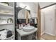Stylish bathroom with a modern sink, updated mirror, and elegant black accents at 518 Buckingham Dr, Indianapolis, IN 46208