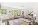 Bright living room with large windows and a fireplace that offers an inviting area to relax at 518 Buckingham Dr, Indianapolis, IN 46208