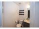 Powder room with a sleek vanity and modern decor, perfect for guests at 5215 Climbing Rose Pl, Indianapolis, IN 46254