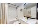 Chic bathroom showcases a tiled shower, a sleek vanity, and contemporary fixtures for a spa-like experience at 615 Orange St, Indianapolis, IN 46203