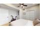 Serene bedroom equipped with a ceiling fan and spacious closet, providing modern comfort at 615 Orange St, Indianapolis, IN 46203