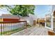 Wooden deck area provides a relaxing outdoor space, adjacent to the detached garage at 615 Orange St, Indianapolis, IN 46203