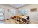 Bright dining room featuring a table with seating and natural light from the windows at 615 Orange St, Indianapolis, IN 46203