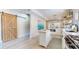 Modern kitchen featuring a central island, stainless steel appliances, and stylish fixtures at 615 Orange St, Indianapolis, IN 46203